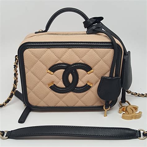 chanel beige and black vanity case|Chanel vinyl vanity bag.